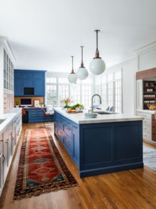 two toned kitchen cabinets with vintage runner