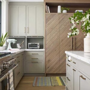 griege kitchen cabinets with chevron wood fridge