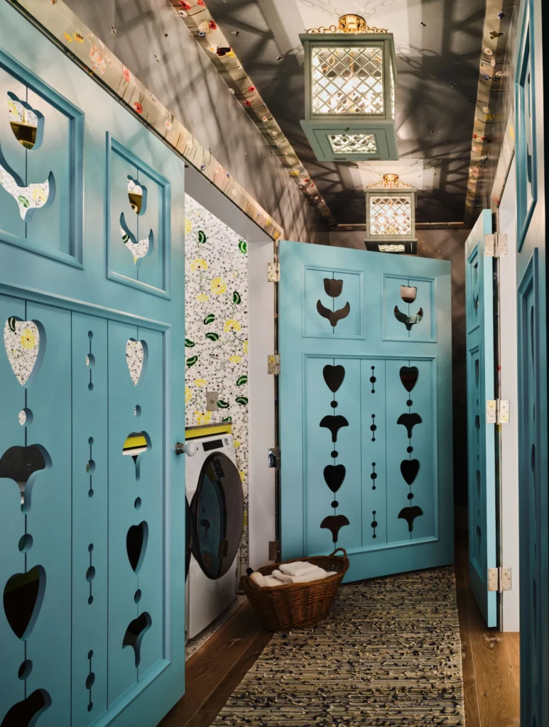 wallpaper hallway with bright laundry room